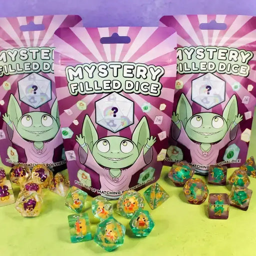 Mystery filled dice packaging with dice on a green background